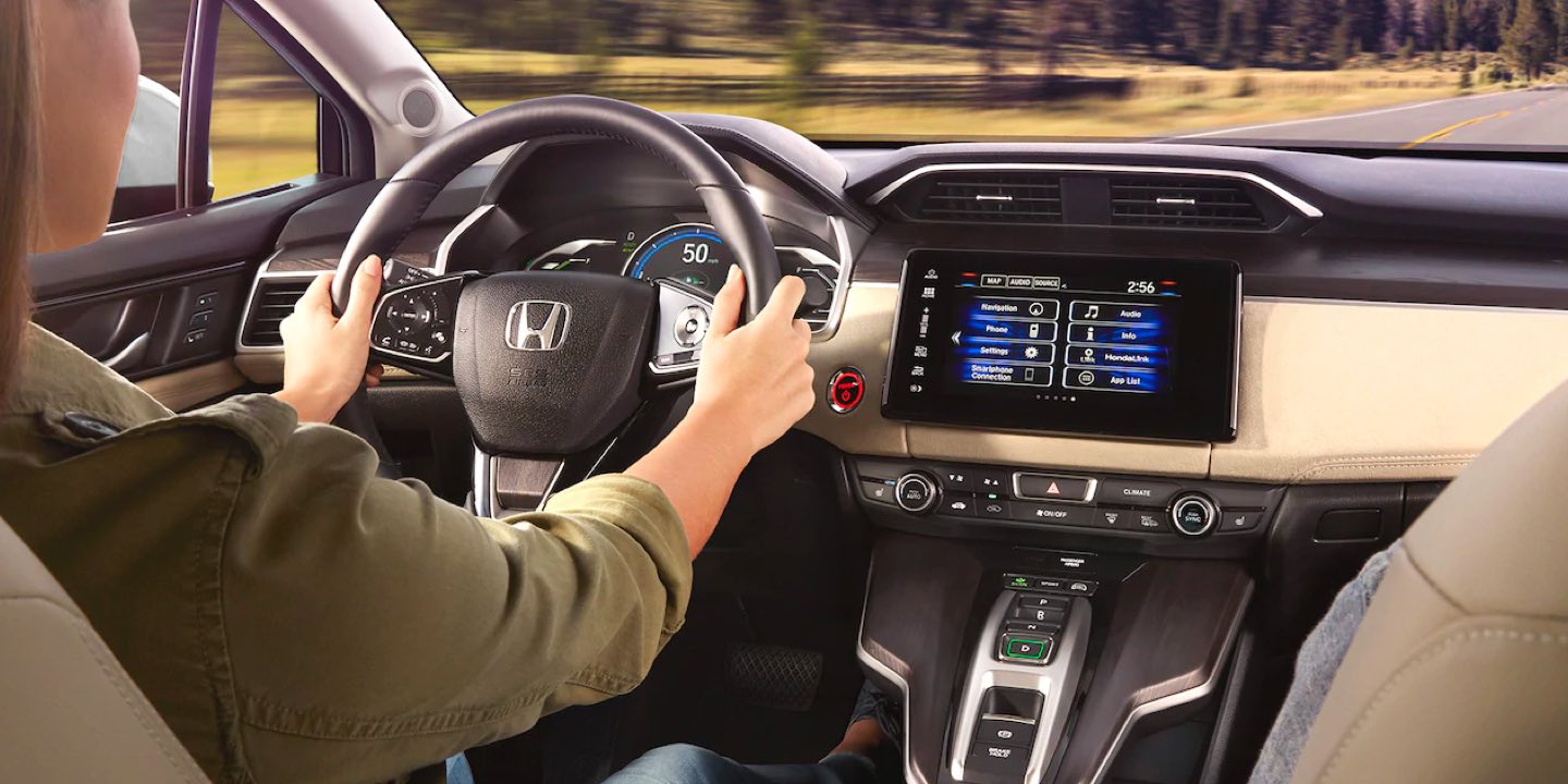 woman driving 2021 Honda Clarity
